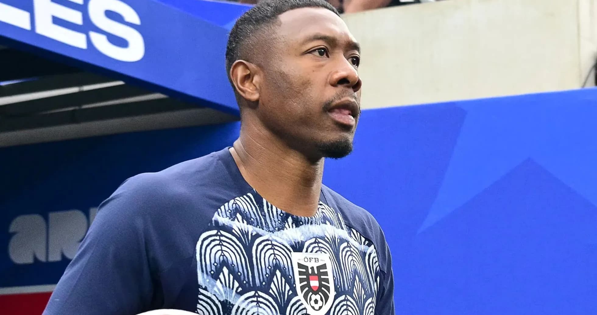 Player walking onto the field before a match