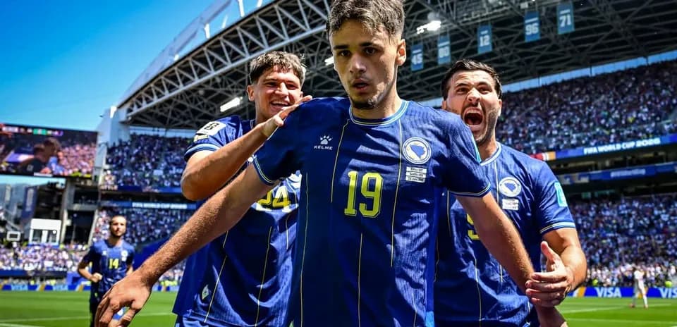 Bosnia players celebrating a goal during a match