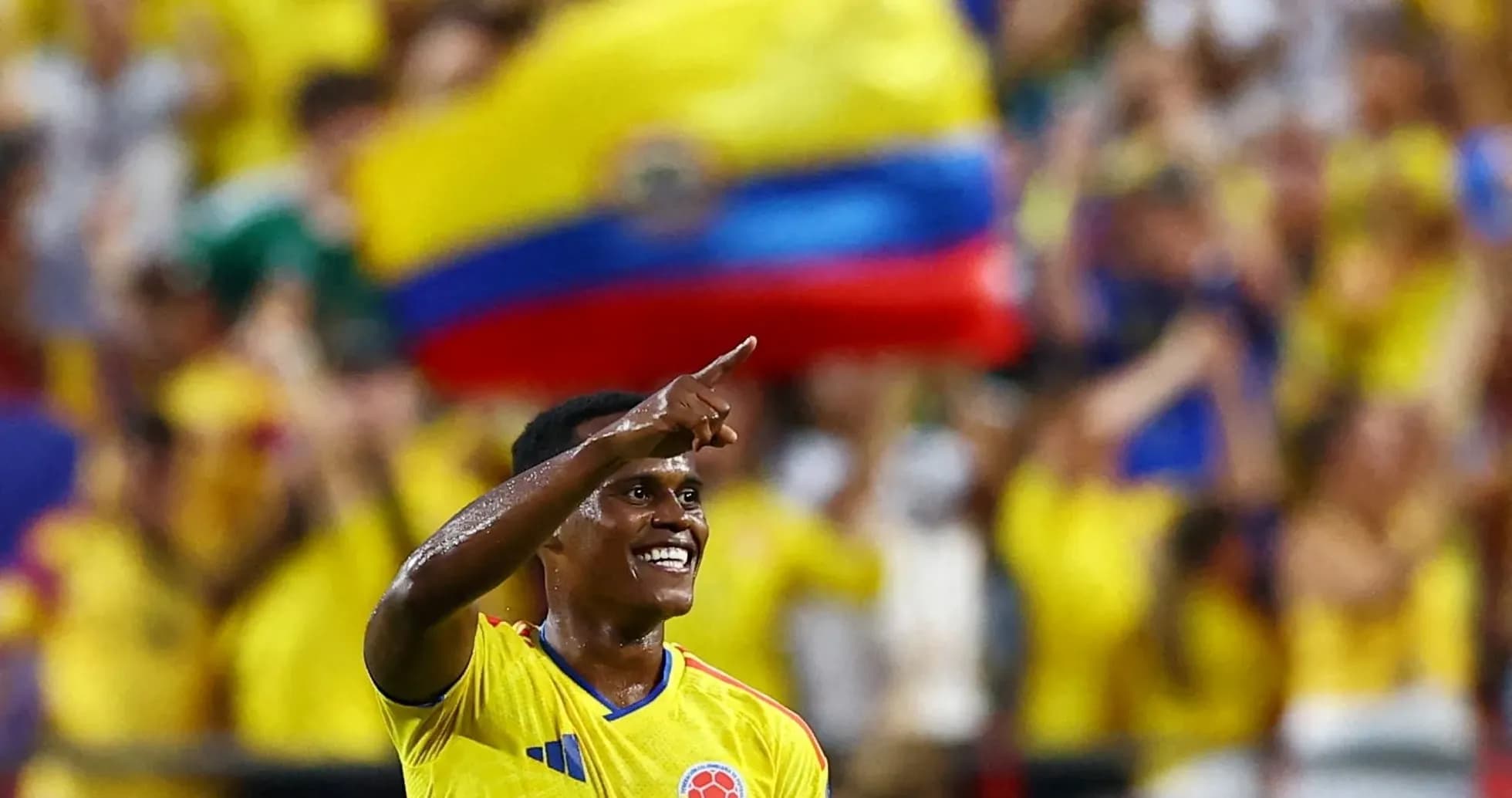 Player celebrating with fans during a match