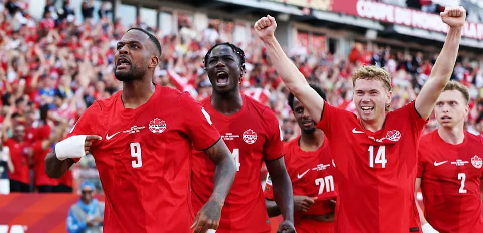 Canada players celebrating during World Cup qualifier