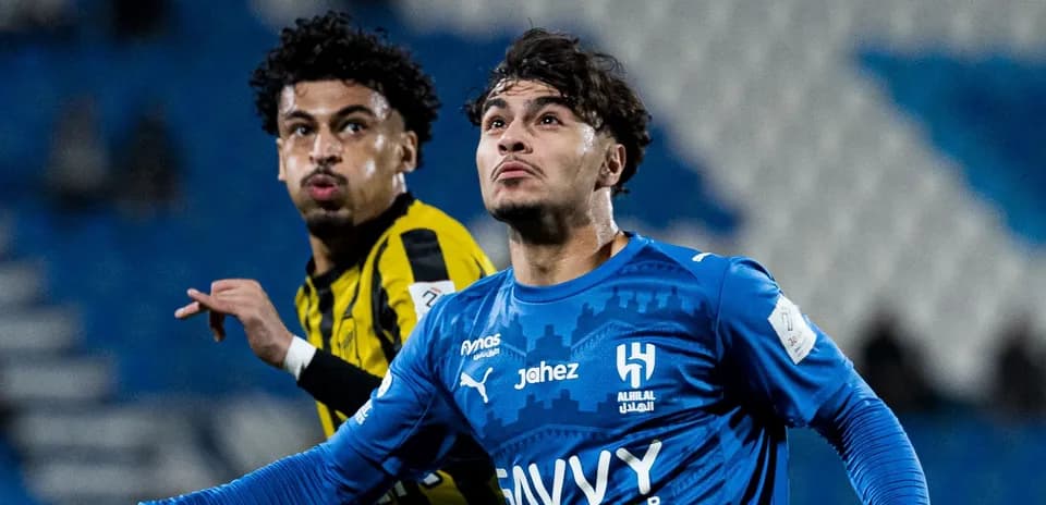 Two players competing during a football match