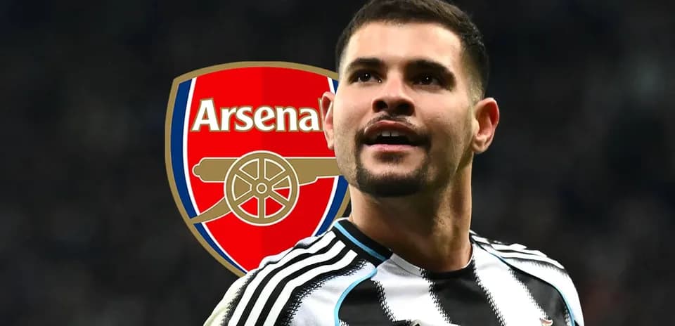 Player celebrating with Arsenal logo in background