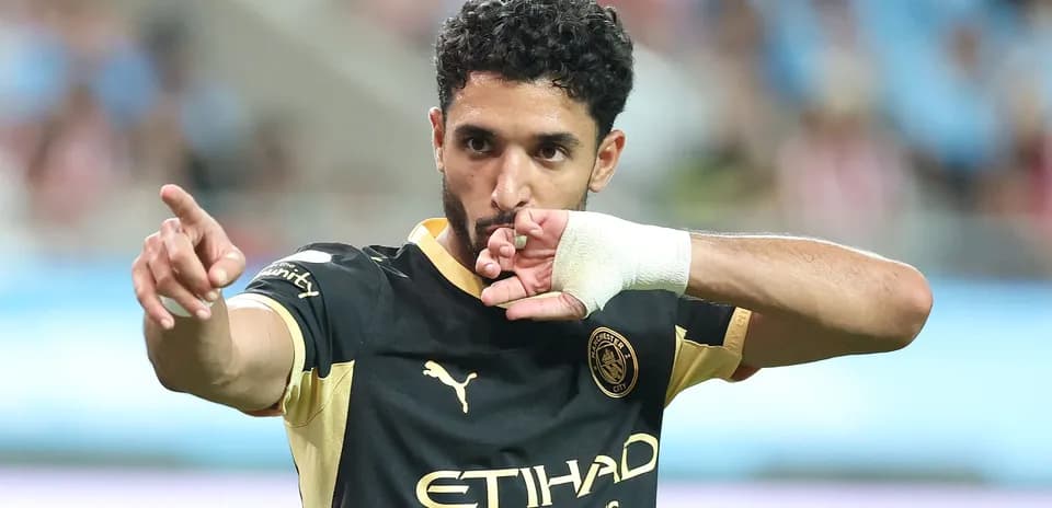 Player celebrating and pointing during a match