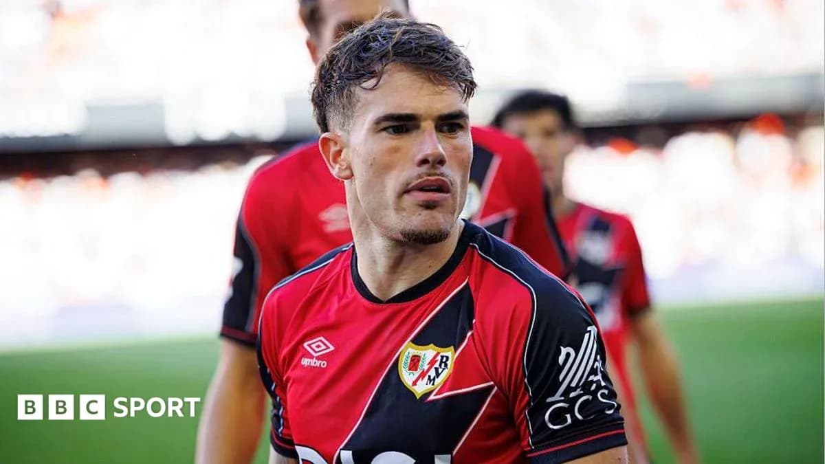 Rayo Vallecano player walking onto the field
