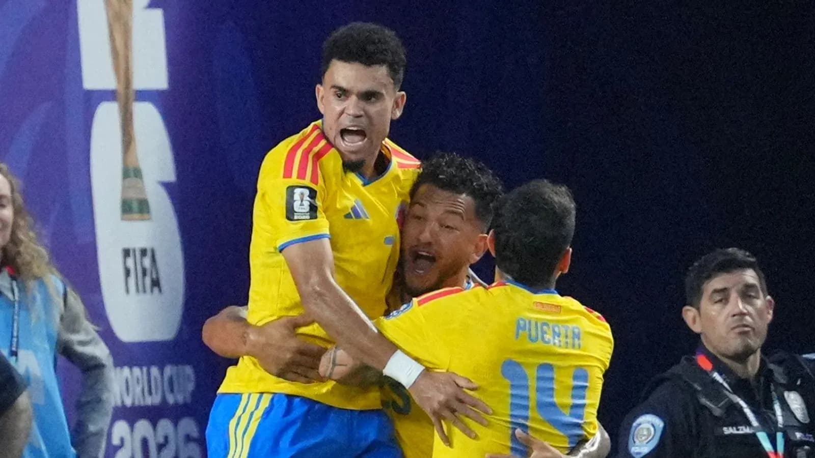 Players celebrating a goal during FIFA match