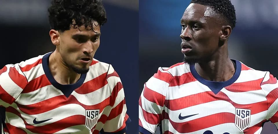 Two USMNT players in striped jerseys during match