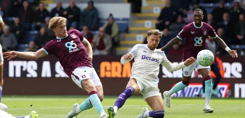 Players competing for the ball during Burnley match