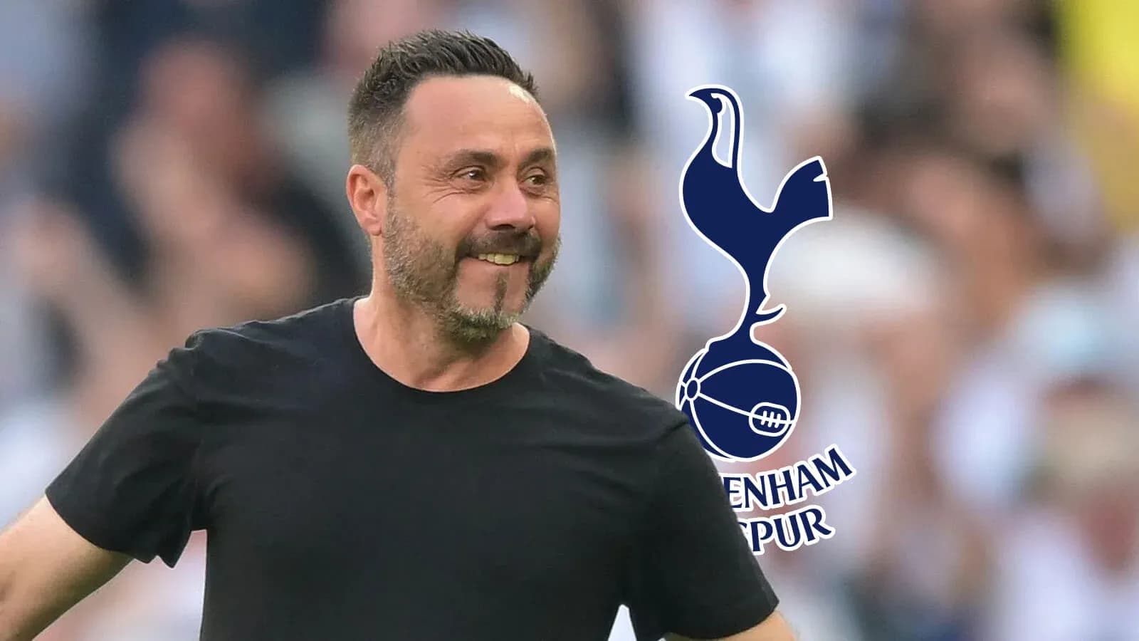 Coach celebrating with Tottenham Hotspur logo in background