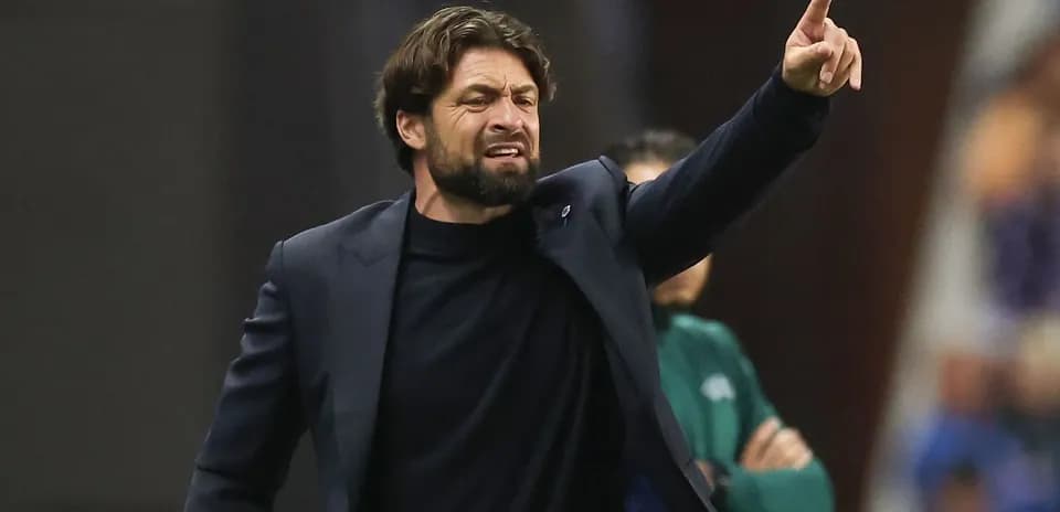 Coach directing players during a match