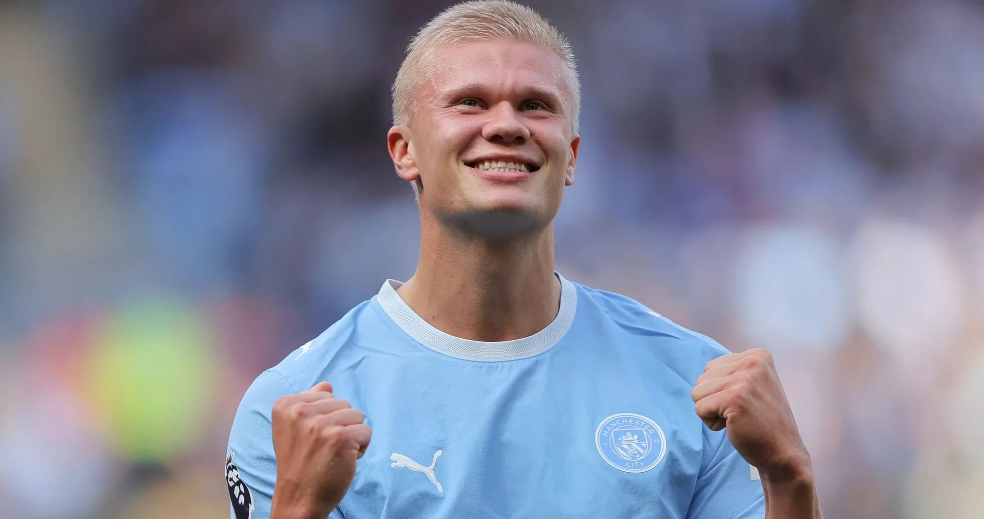 Player celebrating after scoring a goal for Manchester City