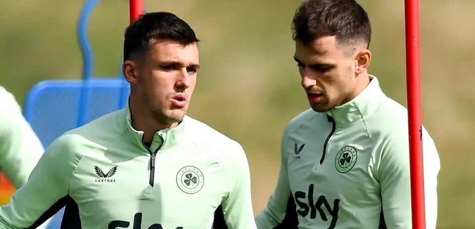 Two players conversing during training session
