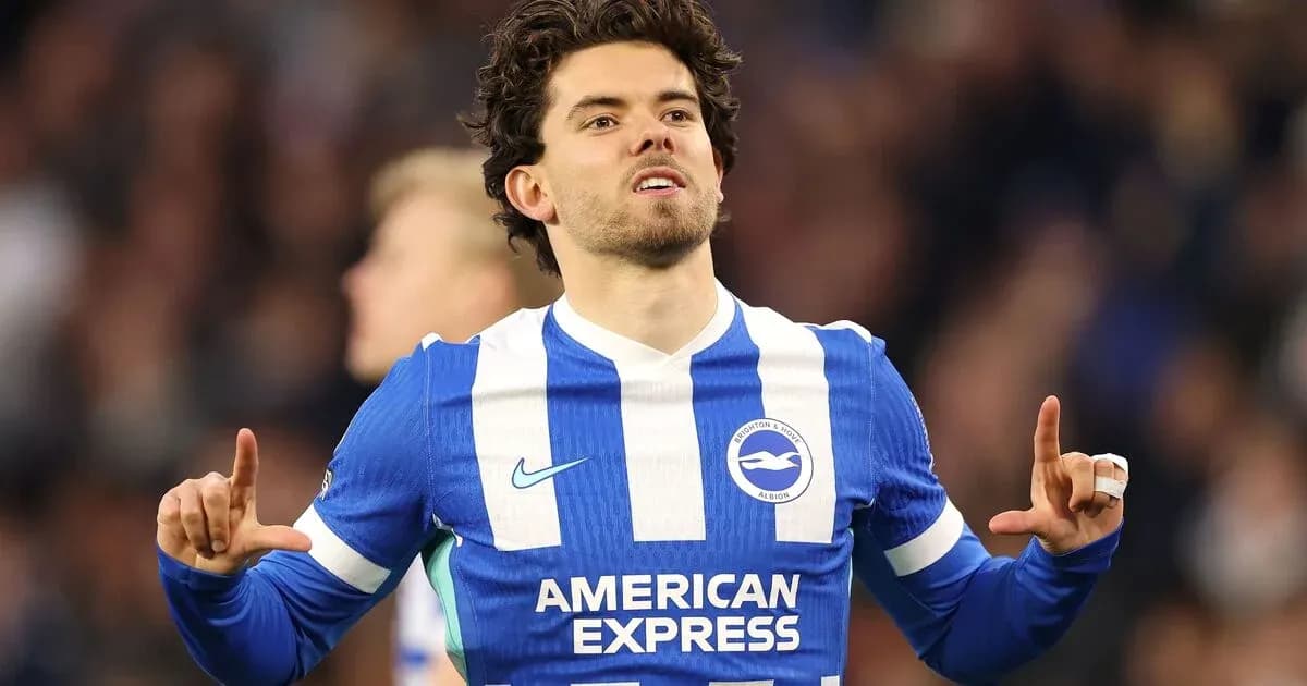 Player celebrating a goal in Brighton kit