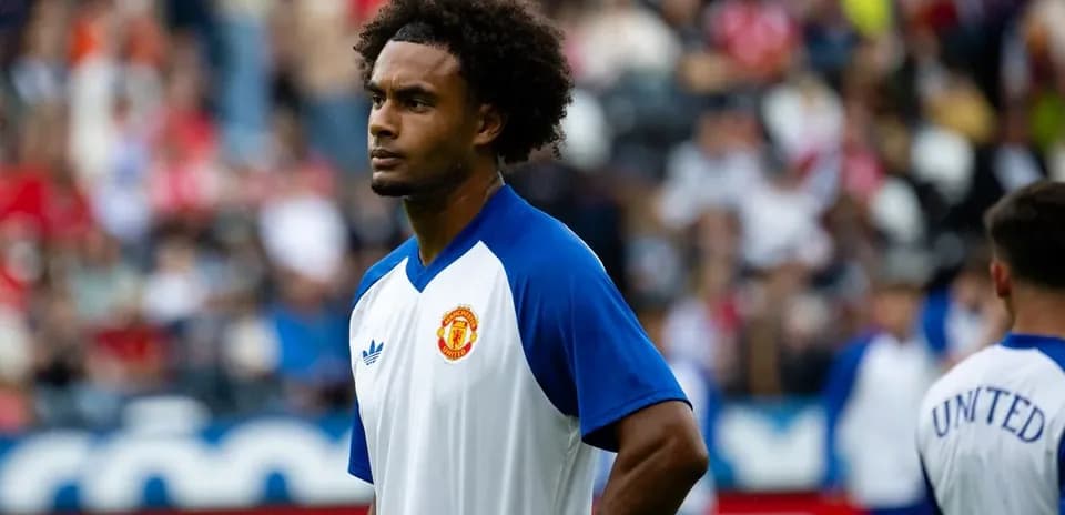 Player warming up before a match for Manchester United