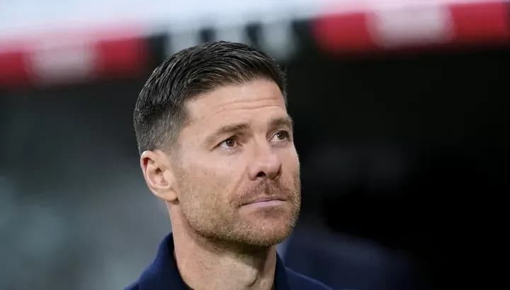 Coach observing the match from the sidelines