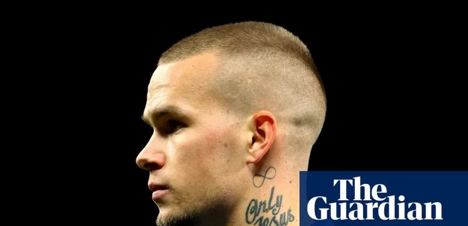 Profile view of a player with a buzz cut