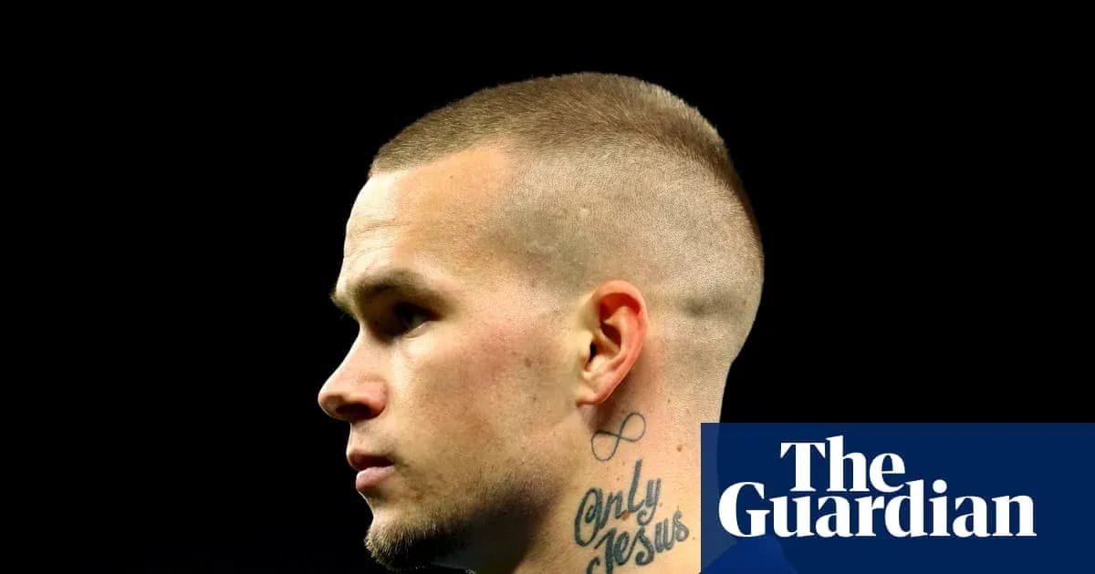 Profile view of a player with a buzz cut