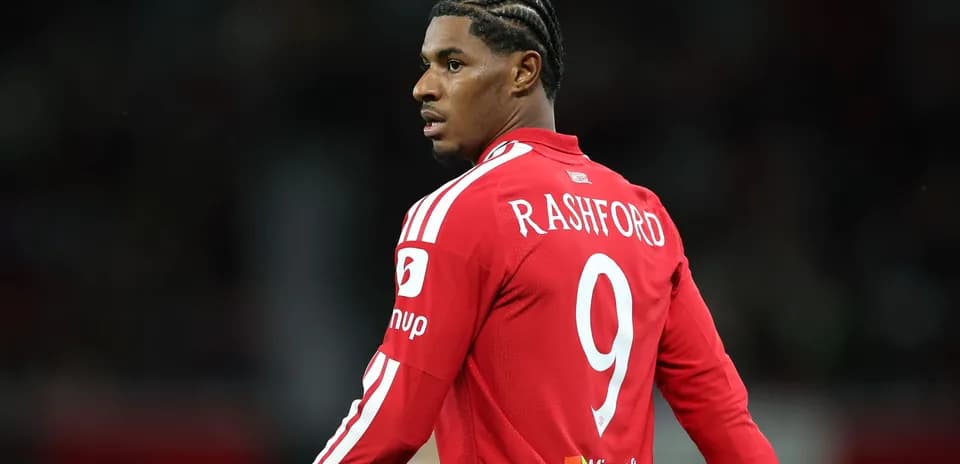 Player in red jersey with number 9 on back