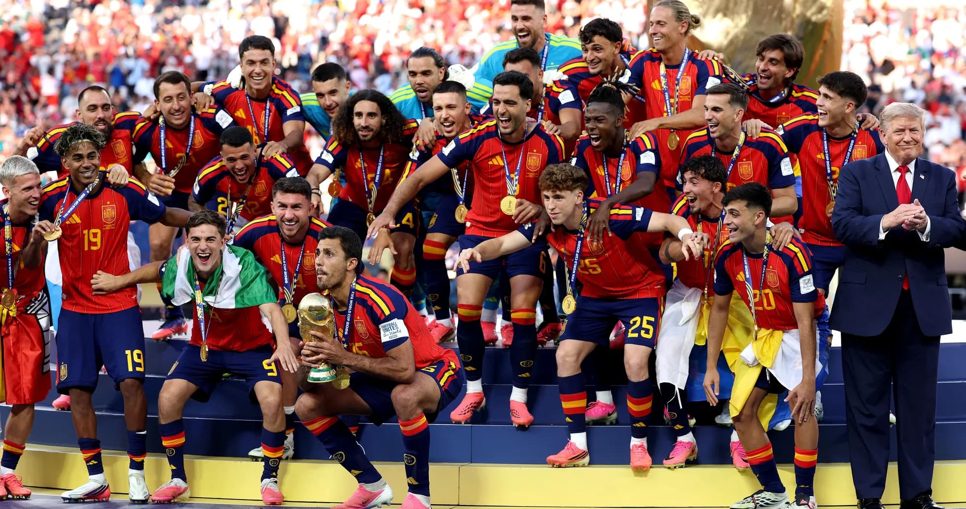 Spain national team celebrating with trophy after victory