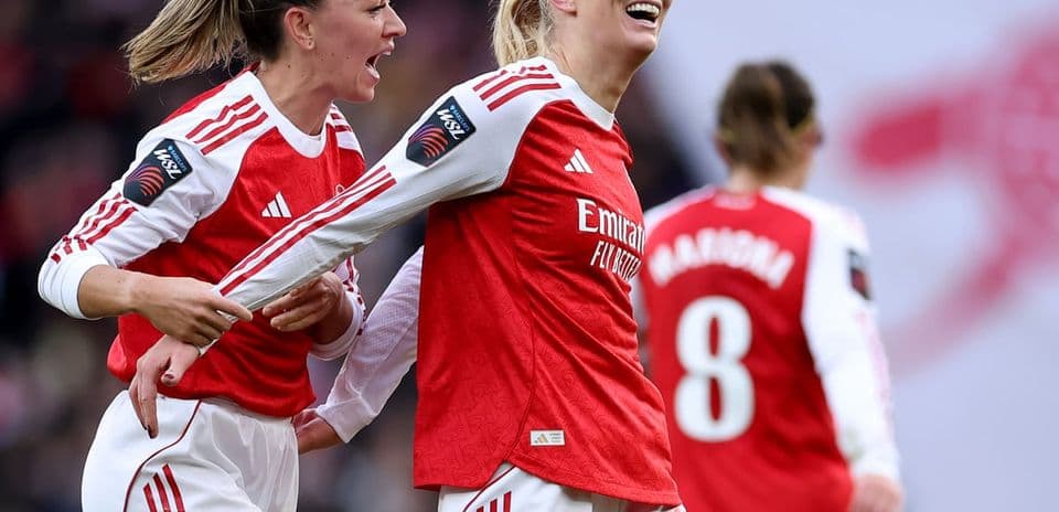 Arsenal players celebrating a goal during match