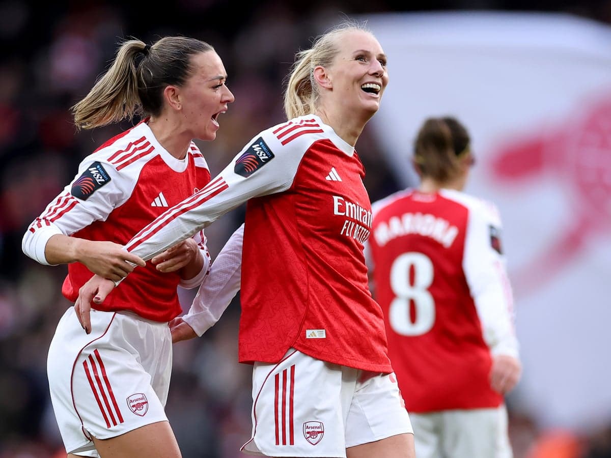 Arsenal players celebrating a goal during match