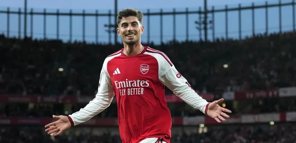 Arsenal player celebrating a goal at the stadium