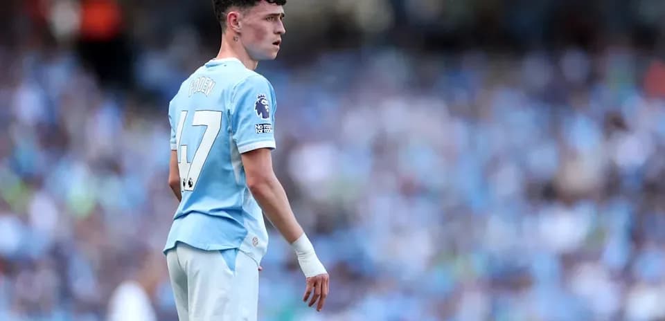 Phil Foden in Manchester City kit during match