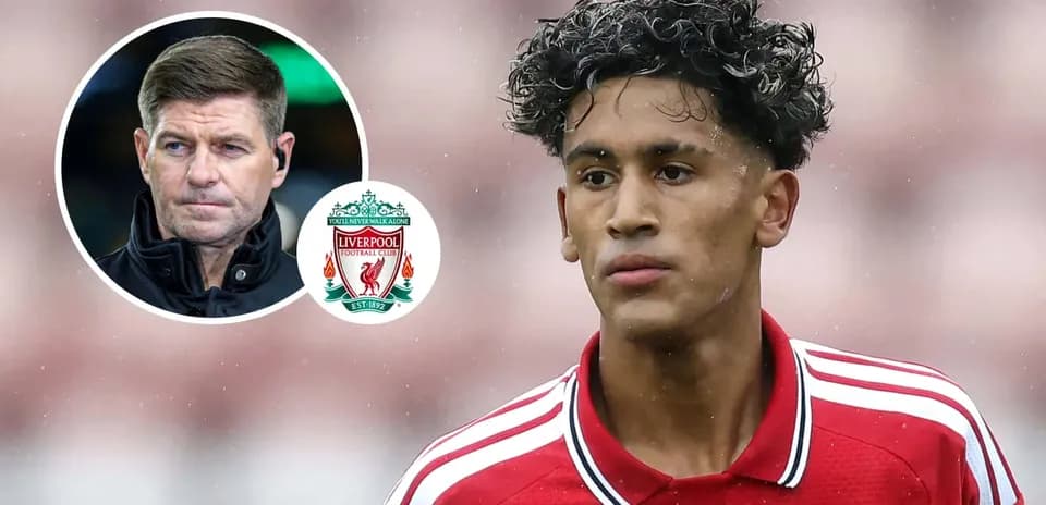 Young player in Liverpool kit with manager's image