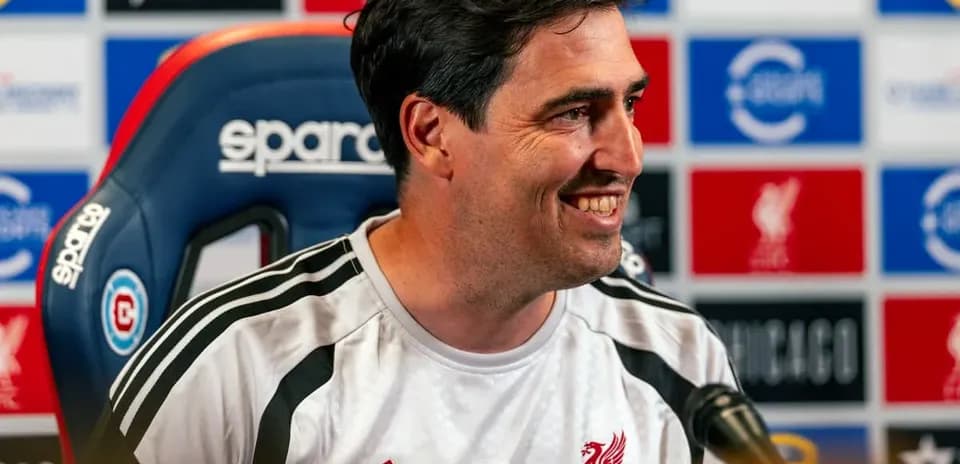 Liverpool coach speaking at press conference