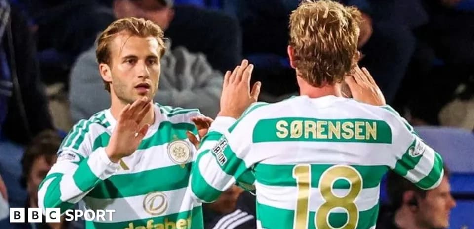 Celtic players exchanging handshakes during match