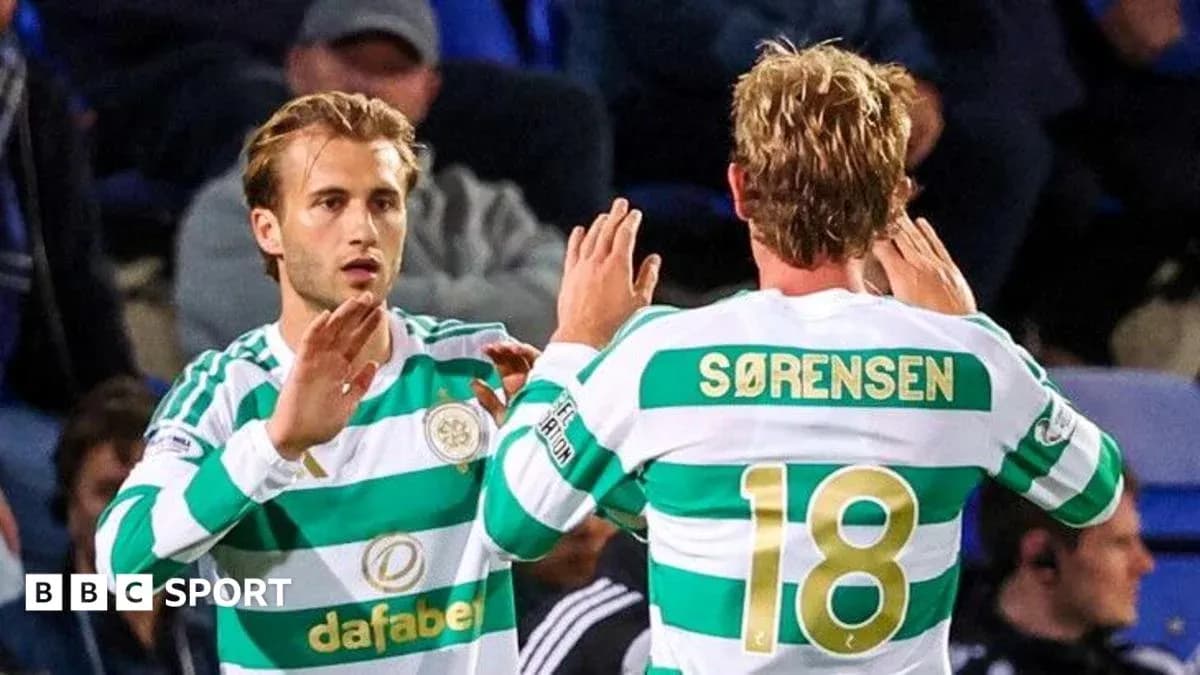 Celtic players exchanging handshakes during match