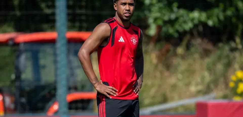 Player standing during Manchester United training session