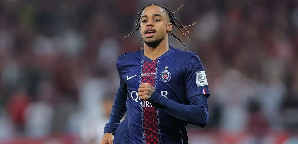 Player running on the pitch wearing PSG jersey