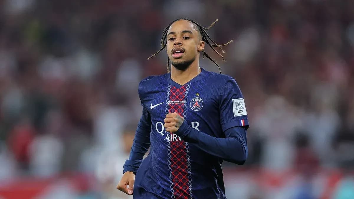 Player running on the pitch wearing PSG jersey