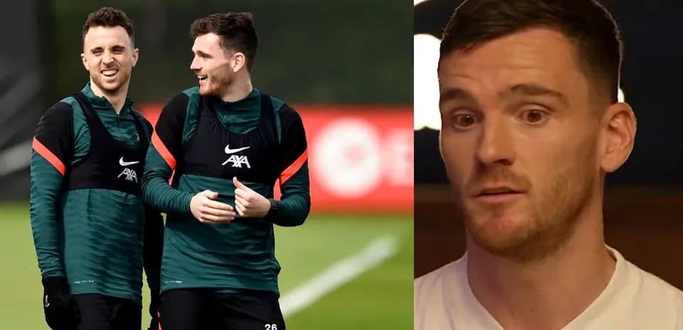 Two Liverpool players training together, discussing tactics