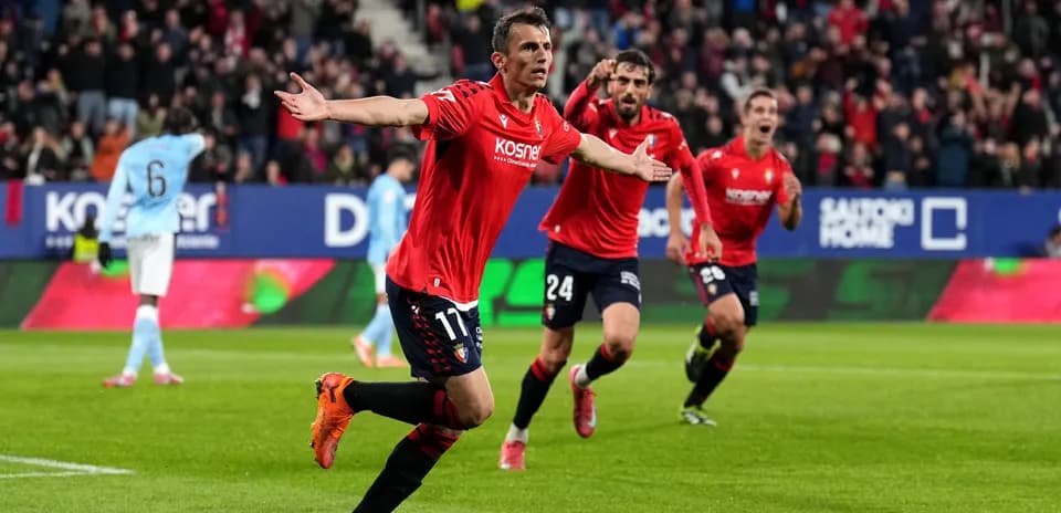 Osasuna player celebrating a goal during match