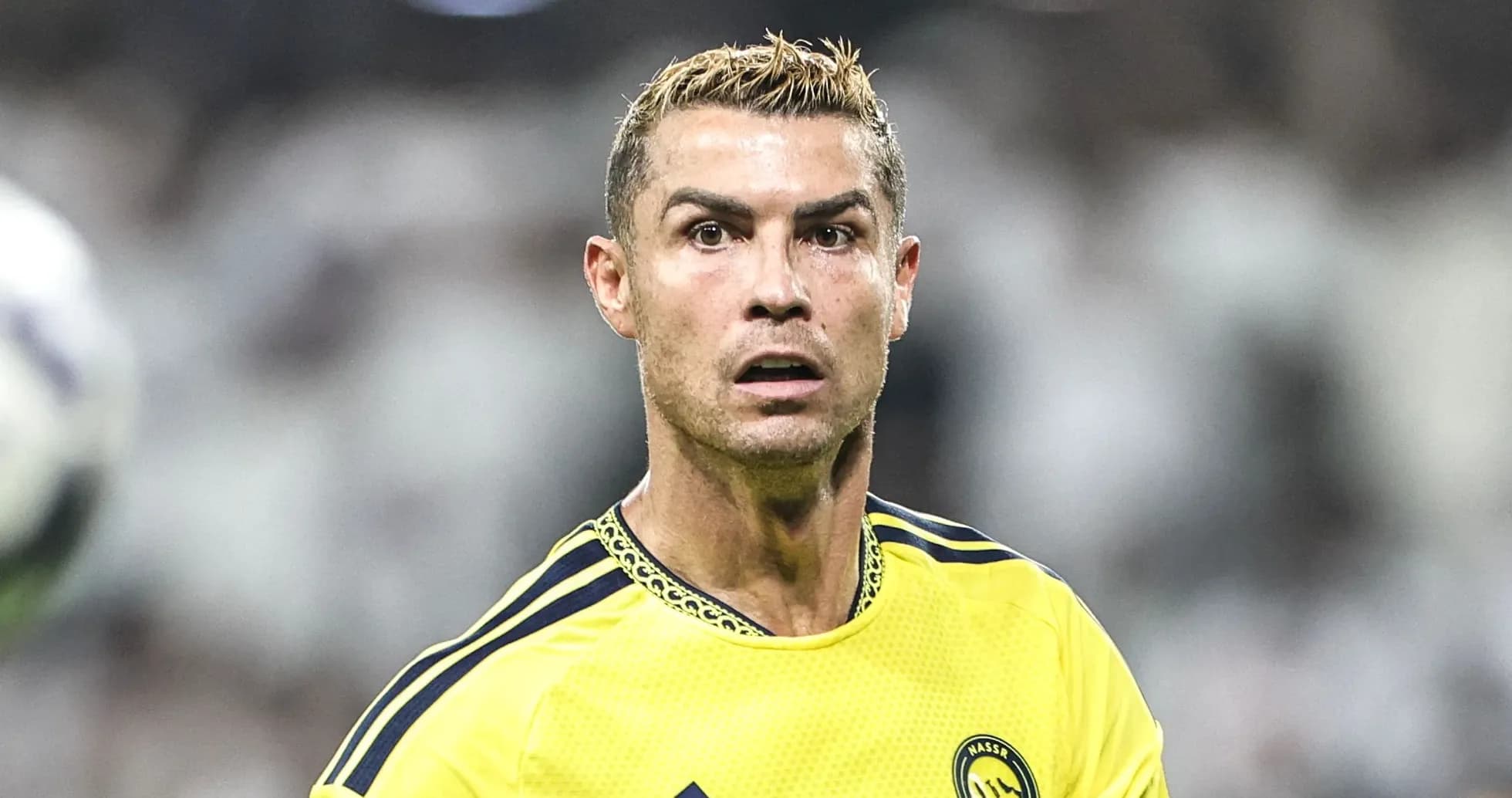 Player in yellow kit during match action
