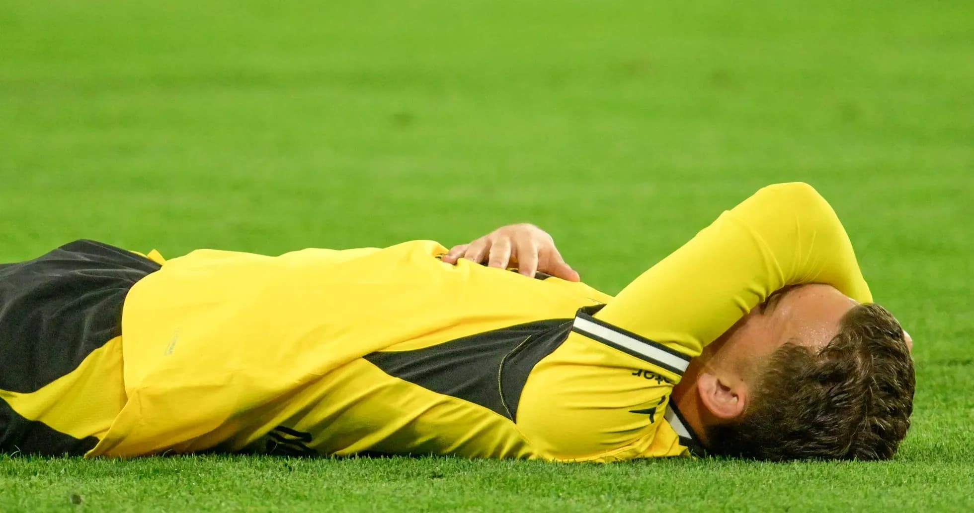 Player lying on the field after a fall