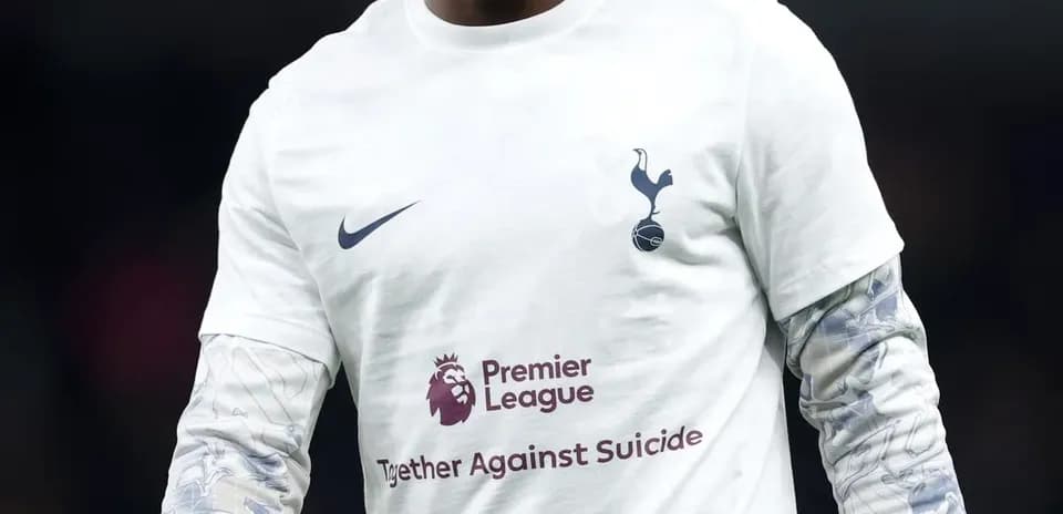 Player wearing Tottenham jersey during warm-up