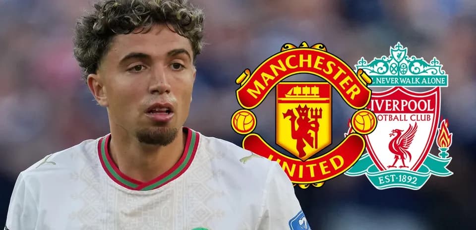 Player in white kit with Manchester United and Liverpool logos