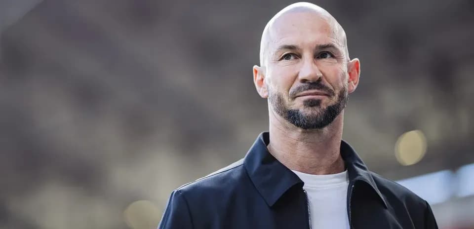 Man with beard and bald head in casual attire