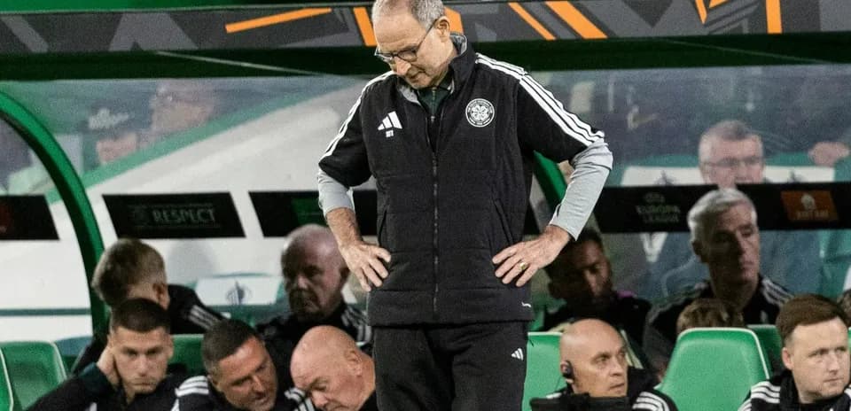 Coach looking down on the bench during match