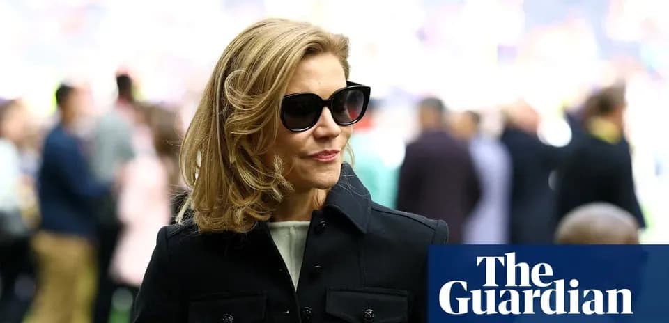 Woman in sunglasses at a sports event