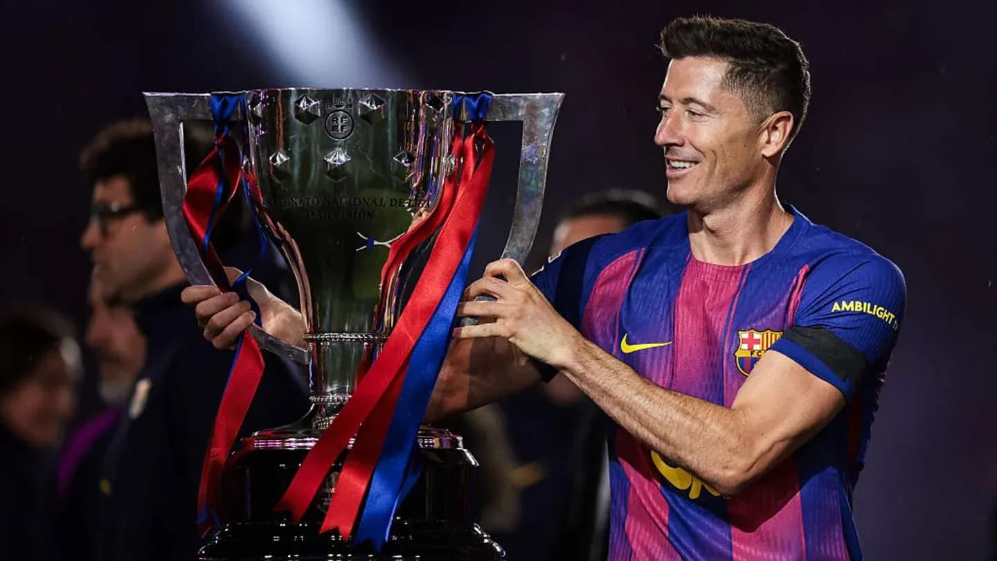 Player holding trophy during celebration ceremony