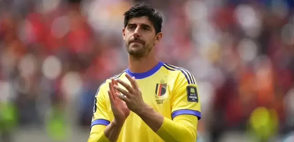 Goalkeeper clapping in Belgium's yellow kit