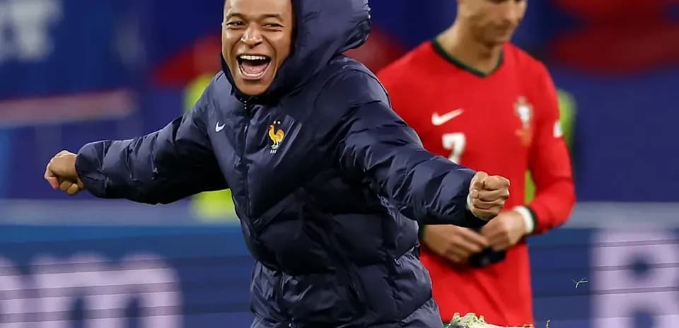 Kylian Mbappé celebrating on the field during match