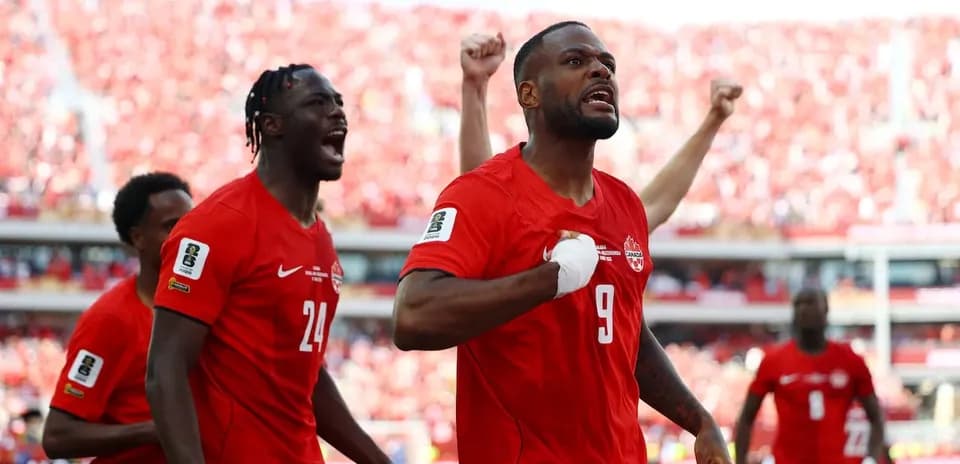 Canadian players celebrating a goal during match