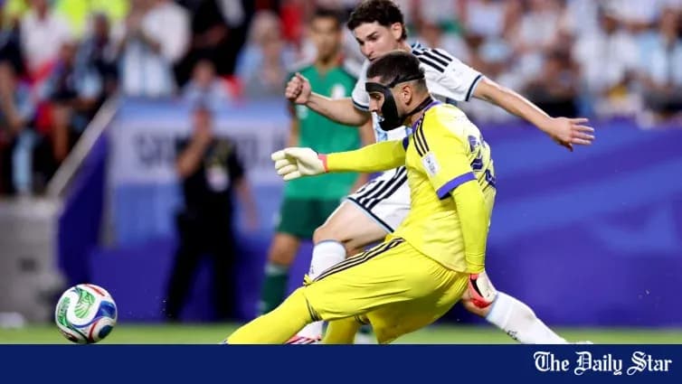 Goalkeeper clearing the ball during match action