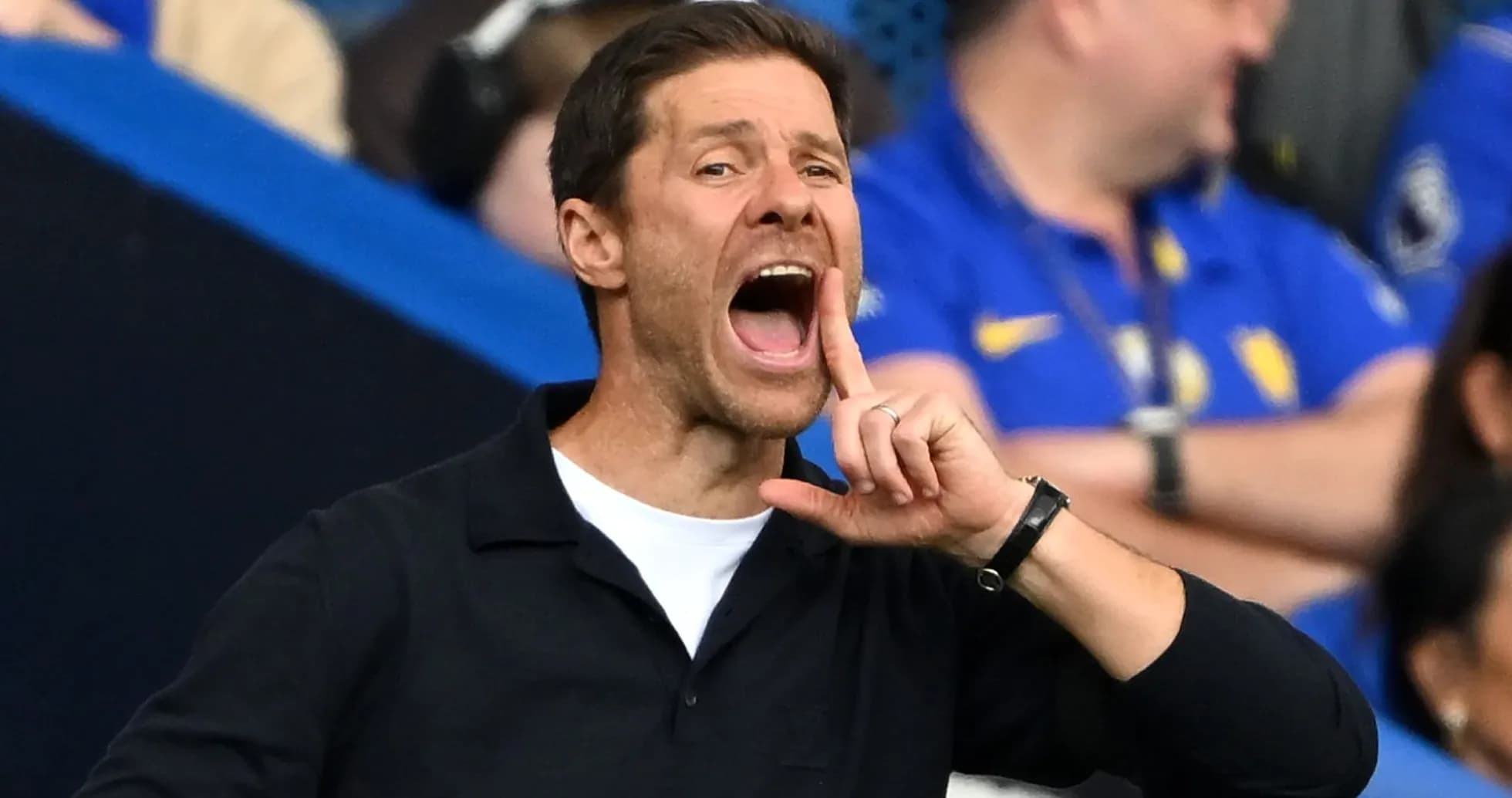 Coach shouting instructions during a match