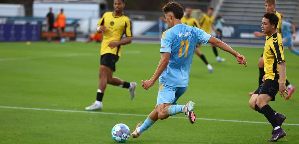 Player shooting the ball during match