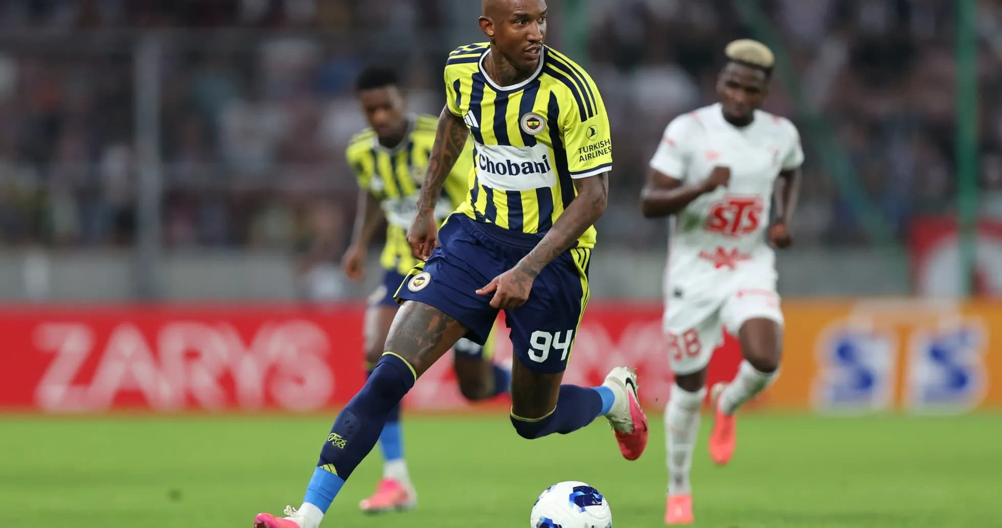 Fenerbahçe player dribbling during match